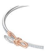 Swarovski Lifelong Bow Rhodium Plated Oval Shaped Bangle With White Crystal 5447079 For Women